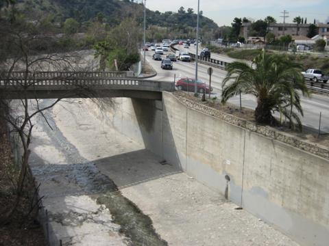Figure 117.  The Arroyo Seco Channel runs adjacent to the Parkway, constraining its width on one side.