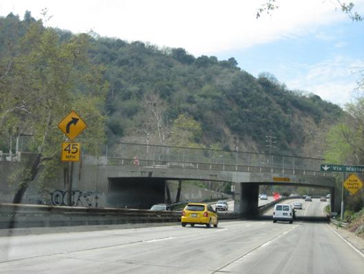Figure 121.  Warning signs for curvature, slowing traffic, and vertical clearance.