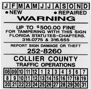 Image. A scanned image of a sign dating label with an anti-theft warning is shown.