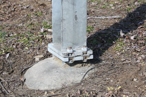 This photos depicts a close up of the base of the posts.