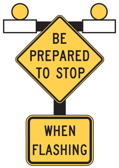 Figure 53. An image of a 'BE PREPARED TO STOP' (MUTCD W3-4) sign above a supplemental 'WHEN FLASHING' (MUTCD W16-13) plaque.  Two yellow beacons are mounted above the two signs.