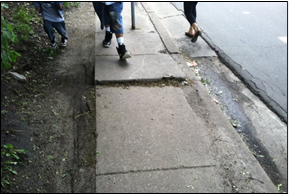 Figure 9: Heaved sidewalk