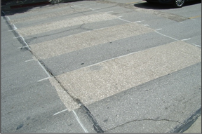 Figure 32: Old crosswalk markings removed for new crosswalk marking tape.