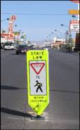 Yield to pedestrians sign