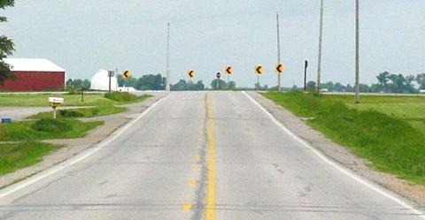 Figures 15. After photographs of Iowa road horizontal curve improved by installing chevrons.