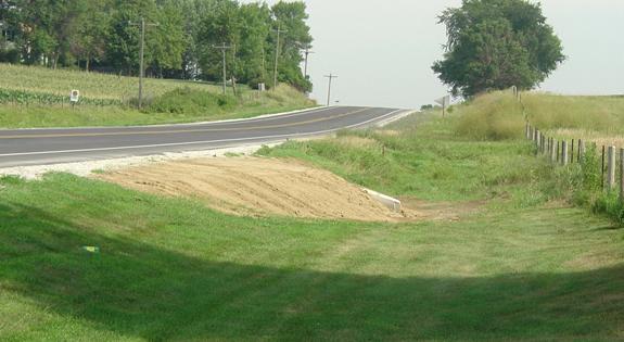 Figure 18. Photograph of culvert extension that provides added clear recovery width adjacent to Iowa road.