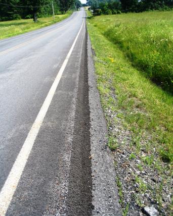 Figure 20. Photograph of "safety edge" on New York road to mitigate pavement edge drop off.