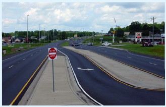 Artist's rendering of a J-turn intersection with a view from oncoming lanes showing improved site distance.