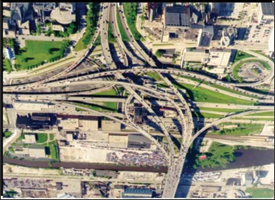 The aerial photo shows the existing Marquette interchange.