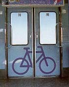 Bicycle stencils on outside and inside doors of Danish State Railways, local "S-Tog" trains indicate those doors where bikes may be brought on board the train. 