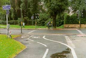 Figure 23-4. Toucan crossings in Great Britain provide separate pedestrian and bicyclist signals where trails cross roadways.