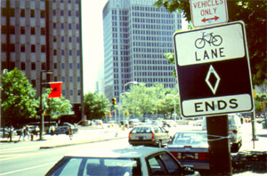 Bike lane ends sign