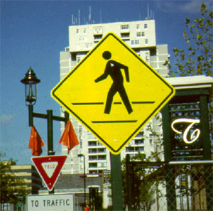 Pedestrian yellow-green warning sign