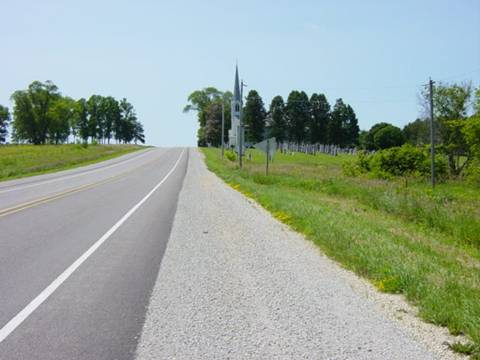 Figure 8.  Partially-paved shoulders on this rural arterial improve bicycle accommodation and reduce risky passing maneuvers.