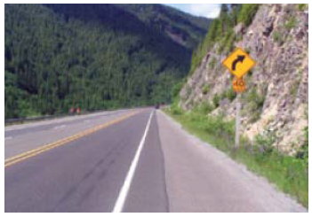 A curving road in mountainous terrain