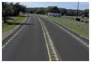 A rural road with center line rumble strips.