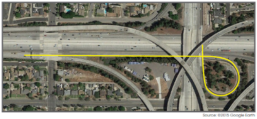 Aerial photograph of an interchange with the centerline of the ramp in question highlighted.