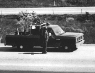 Report Cover: Photograph of a truck on a road