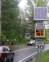 Photo.  Photo of a speed feedback sign which is a changeable message sign that displays the speed of approaching vehicles.