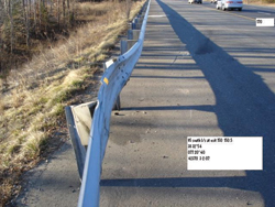 Photo. This photo shows a guardrail which is bent less than 6 inches.