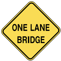 Warning sign: ONE LAND BRIDGE sign