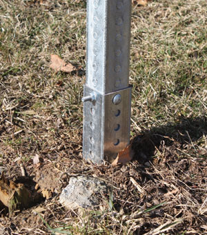 Photo of example breakaway square steel posts is shown. This is a photo of a sleeve assembly.