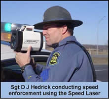 Sgt D J Henedrick conducting speed enforcement using the Speed Laser
