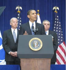 President Obama giving speech with Vice President Biden and Transportation Secretary LaHood behid him