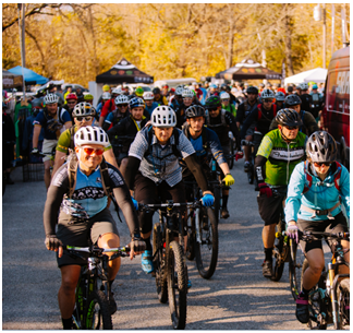 Bicyclists ride in the International Mountain Bicycling Association 2016 World Summit through Ozark Mountains in Northwest Arkansas. Photo provided by the Walton Family Foundation.