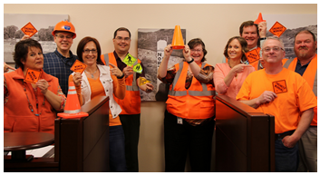 FHWA's North Dakota Division Office staff wears orange clothing on April 5, 2017, Go Orange Day, as part of National Work Zone Awareness Week.