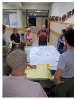 Attendees participate in group discussions at a Pedestrian Safety Forum.