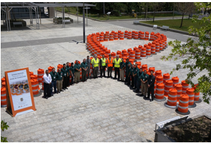FHWA Puerto Rico division staff pitch in to remind drivers to slow down to save lives in work zones.