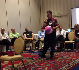 Summit facilitators introduced an element of fun by encouraging attendees to toss the beach ball to the person who had the floor to ask or answer a question.