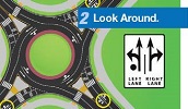 Illustration reads 2: Look Around and shows a roundabout with a sign showing that the left lane is straight and left turn, while the right lane is straight and right turn.
