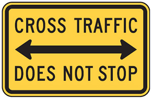 Figure 21. An image of a 'CROSS TRAFFIC DOES NOT STOP' (MUTCD W4-4P) plaque.