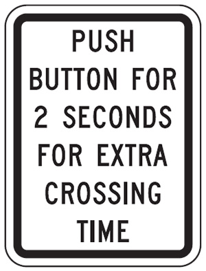 Figure 91. An image of a 'PUSH BUTTON FOR 2 SECONDS FOR EXTRA CROSSING TIME' (MUTCD R10-32P) sign.