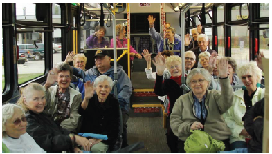 Image shows seniors riding the The Rapid (the bus system serving Grand Rapids, Michigan