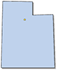solid light blue map of Utah with a gold star showing the location of the capital, Salt Lake City