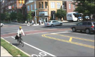 Photo: Bike rider using the bicycle marked lane