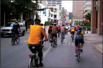 Photo: Group of bike riders, riding to work on Bike to Work Day