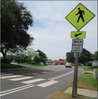 Photo: Caption: Figure 3: Crossing Improvements Included Pavement 