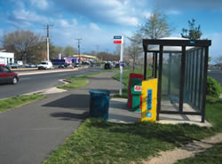 A wide sidewalk in the photo above has been provided to allow pedestrians to access this bus stop.