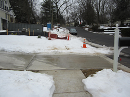Nearby construction and unshoveled snow makes this sidewalk impassable in Virginia.