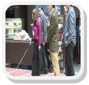 Photo: Visually Impaired person walking with assistance cane