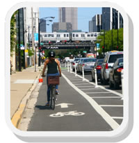 Biker ride bike lane or busy road