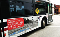 Photo: Bus with safety tip bulletin on the side