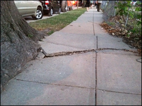 Picture of a raised sidewalk defect