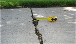 Title: Photos of sidewalk gaps – Description: Opening in between sidewalk slabs greater than 2" in width, or those caused by the absence of a fragmented section of sidewalk exceeding 2" in width