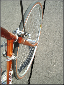Figure 22: Cracking can cause trip hazards as well as hazards for bicyclists and wheelchair users. This crack is on a shared use path.