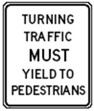 Sign: Turning Traffic Must Yield To Pedestrians